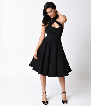 Unique Vintage 1950s Style Black Criss Cross Halter Flare Rita Dress